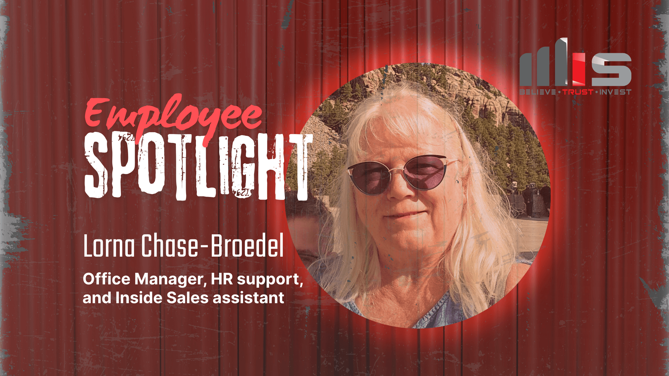 A circular portrait photo of Lorna Chase-Broedel smiling outdoors with rocky landscape and trees in the background, set against a red corrugated metal backdrop with a dramatic spotlight effect. Text identifies her as Office Manager, HR Support, and Inside Sales Assistant."