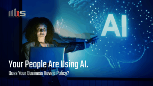 a woman at a laptop reaching toward a glowing AI hologram with a digital brain graphic and large 'AI' lettering on a dark blue background. Text reads: 'Your People Are Using AI. Does Your Business Have a Policy?'